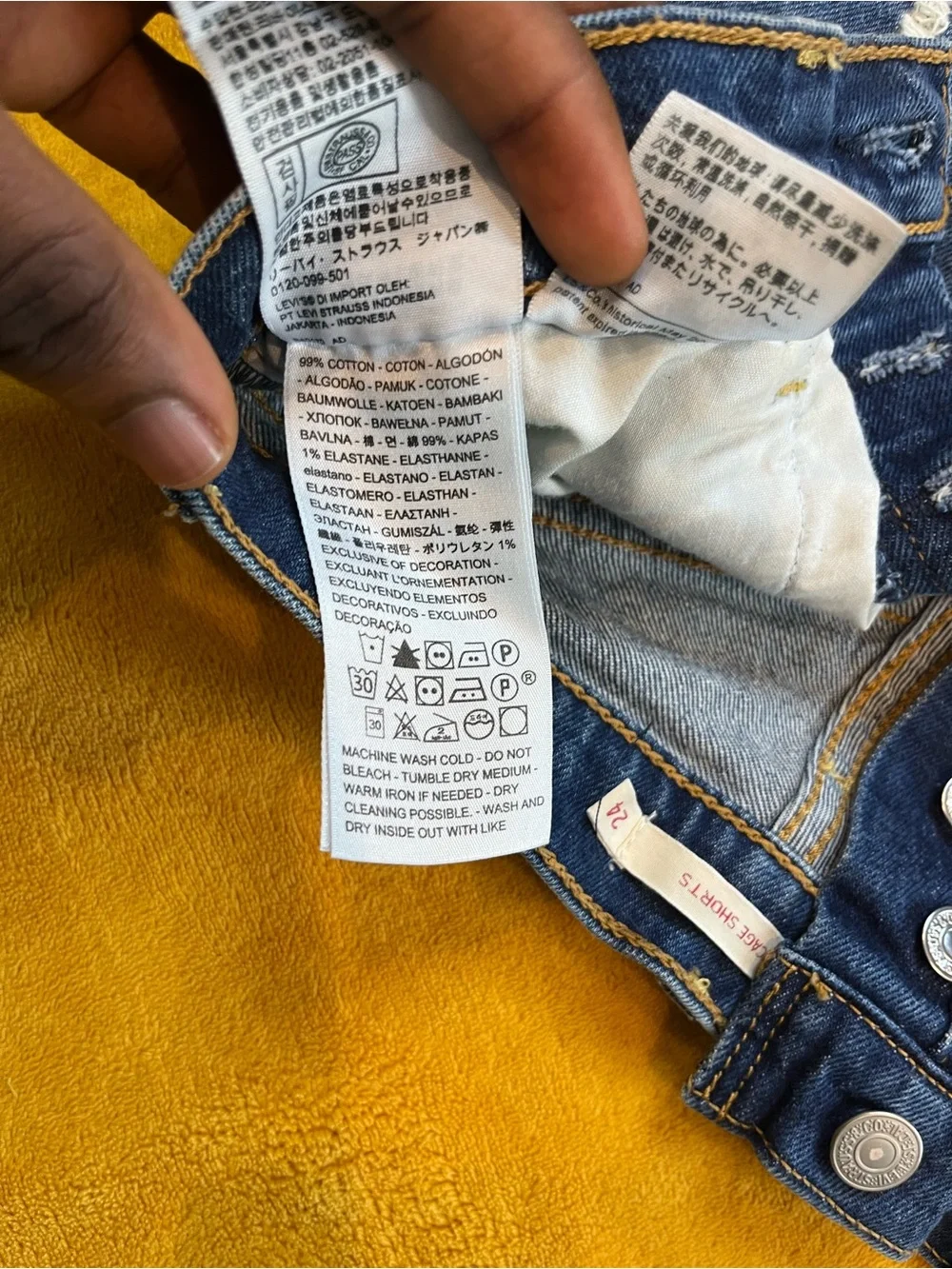 Levi’s High-Rise Distressed Denim Shorts — Blue